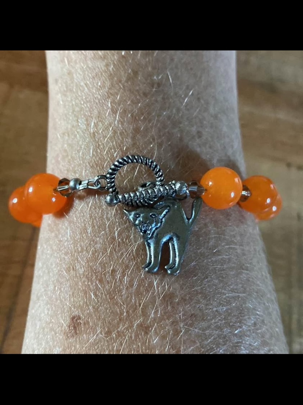 Orange Beaded Bracelet with Black Cat Charm